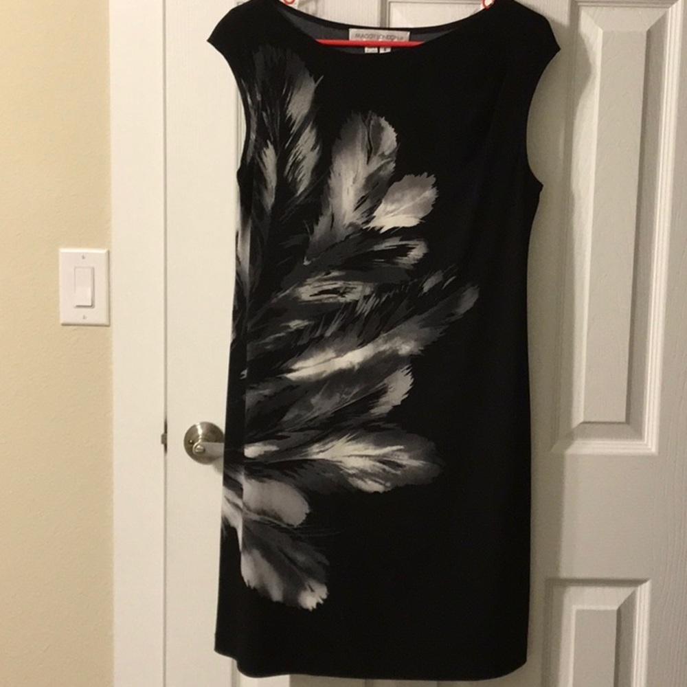 Black dress with feather print